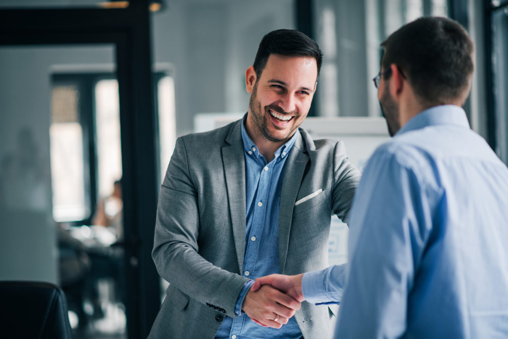 Manager shaking hands